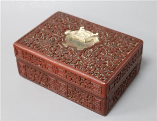A Chinese red lacquer box and cover